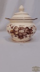 Sopeira redonda em ceramica  vitrificada.  decorada com flores.Medida 14cmx15 cm, Apresenta pequenos bicados conforme a foto