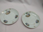 2 Pratos com cena galante porcelana Monte Alegre