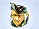 ROYAL DOULTON - Raro mug de coleção em porcelana representando '' Robin Hood '' , marca da preciosa manufatura Royal Doulton sobre a base , Inglaterra 1959 . perfeito estado de conservação , mede 7,0 cm de altura x 6,5 cm de comprimento .