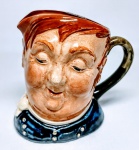 ROYAL DOULTON - Raro mug de coleção em porcelana representando '' Fat Boy '' , marca da preciosa manufatura Royal Doulton sobre a base , Inglaterra século XX . perfeito estado de conservação , mede 10 cm de altura x 12 cm de comprimento .