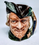 ROYAL DOULTON - Raro mug de coleção em porcelana representando '' Robin Hood '' , marca da preciosa manufatura Royal Doulton sobre a base , Inglaterra 1959 . perfeito estado de conservação , mede 6,5 cm de altura x 6,5 cm de comprimento .