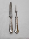 Garfo trinchante e facão em aço inox Hercules, modelo Classique. Sendo um dos dentes do garfo com a ponta quebrada