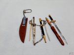 Lote de 6 punhais, abre cartas diversos para colecionador. Medindo a espada com pega preta 12cm de comprimento.