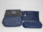 Quatro itens da extinta companhia aérea Varig: um estojo em tecido preto, 2 estojos e 1 carteira de mão em corino azul. Maior 9 x 19 x 10cm.