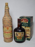 Duas garrafas de antigas edições da cachaça Ypioca: uma da edição Superior, safra de 1961, 1 litro; e uma comemorativa de 150 anos da Ypioca, 700ml, lacrada.