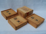 Quatro caixas de charutos colecionáveis em madeira: 3 com letras japonesas encrustadas na tampa, 4 x 13 x 13cm; uma da manufatura cubana 