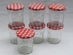 Sete potes de geleias colecionáveis em vidro, da marca de geleia francesa Bonne Maman, tampas em alumínio. Alt. 10cm.