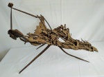Escultura  exótica em ferro em formato de teia de aranha , mede  70 cm de comprimento.