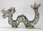 PALATNIK – Escultura cinética representando dragão em resina de poliéster de manufatura Abraham Palatnik. Medindo 13 cm de altura por 18,5 cm de comprimento. 