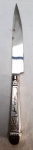 Belíssima faca gaúcha, da marca ELMO , produzida em metal espessurado à prata, com representações típicas,  maior comprimento 21 cm. NÃO TEM A BAINHA; Numeração interna da galeria 11