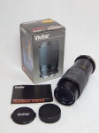 Lente para câmera fotográfica Vivitar 70-210mm F4.5-F5.6 Macro 1.4x, na caixa original. Vidro da lente com leves mofos. Alt. 14cm.