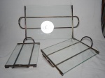 Conjunto de 3 bandejas em vidro, base e alças em metal espessurado à prata. Marcadas Riva. 31 x 18cm, 41 x 26cm e 47 x 30cm.