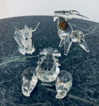 Miniatura  Três miniaturas de coleção em cristal eslovaco representando touro, lagosta e bode. Med. 6x10 cm. / 9x7 cm. / 7x6 cm.