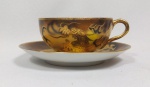 Belíssima Xícara de chá  em porcelana japonesa Satzuma casca de ovo com decoração de dragão dourado.