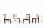 Branco & Preto (Atribuído) - Set de quatro cadeiras executadas em jacarandá maciço com assentos e encostos em palhinha natural. Peças apresentam detalhes das junções aparentes (finger-joints) característicos da produção da Branco & Preto. Brasil, c. 1950. 86 x 43 x 49 cm.