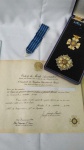 Militaria - Comenda Mérito Aeronáutico - na caixa - (Placa, Medalha de pescoço com a Fita, Roseta, Barrete e Diploma datado de 1973 em nome do agraciado o qual será revelado apenas ao vencedor do lote). Fabricante Randal (Rio de Janeiro) - República Federativa do Brasil.