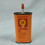 Antiga lata Americana para lubrificação de Armas e demais utensílios, com líquido em seu interior.