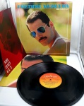 LP Disco de Vinil - Freddie Mercury - Mr. Bad Guy - 1985. Capa e disco em ótimo estado. Disco com encarte e com outro encarte sobre o Freddie.