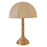 Made in Italy. Séc. XX - Luminária de mesa em metal amarelo. Cúpula em tecido. 47 x 22 cm (base). 26 x 48 cm (cúpula).