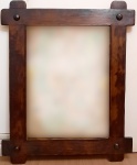ANOS 60 - Grande espelho com moldura em madeira. Med. 100 x 81 cm.