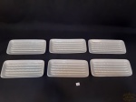 Jogo de 6 pratos com divisorias  em ceramica vitrificada branca americana para servir aspargos.  Medida 21X9,5 cm.