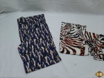 Lote de roupas Feminina. Composto 1 calça estampada Tam: 38 e 1 blusa Tam: M. Peças em bom estado de conservação.