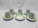 Jogo de 5 xícaras de café com 6 pires em porcelana estampada.