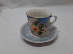 Xícara de chá dita caipira em porcelana com relevos.