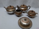 Jogo de servir chá e café com 5 peças em prata 90 Meridional EPS. Composto de 2 bules, leiteira, açucareiro e manteigueira. Banho com desgaste.
