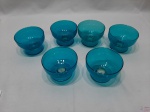 Jogo de 6 taças de sorvete, sobremesa em cristal azul turquesa. Medindo 10cm de diâmetro x 6,5cm de altura.