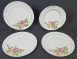 Schmidt - Três pratos rasos e um fundo em porcelana nacional, com delicada decoração floral e fios de ouro. Medindo: 25 cm e 4,5 x 23 cm. Um com bicado.