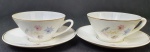 Real - Duas xícaras para chá em porcelana, com decoração floral e fios de ouro. 