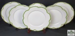 Rosenthal, Bavaria - Seis pratos rasos em porcelana alemã na cor branca, com detalhes filetada a ouro, listra verde e bordas recortadas. Medindo: 25 cm
