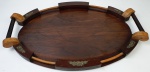 Bandeja em madeira, com aplicações em metal. Medindo: 48 x 32 cm. Falta uma placa, conforme foto. 