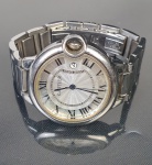 Relógio de pulso em aço inox "Cartier", funcionando. Autenticidade não atestada.