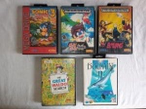 RETRÔ GAMES - Cinco cartuchos para console Mega Drive dos jogos: "Sonic the Hedgehog 3", "Chiki Chik Boys", "Ex-Mutantes", "The Great Waldo Search" e "Eco the Dolphin II". Usados e sem garantias.