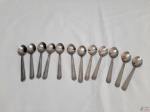 Jogo de 12 colheres de café em aço inox Wolff. Medindo 9,5cm de comprimento.
