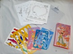 Lote composto de prancheta em acrílico, diversas formas para pintura, estojo com diversos lápis para colorir, etc.