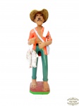 Escultura Pescador em Barro Cozido Assinado Severino Barbosa. Apresenta Restauro no Braço e Bicado nos Peixes. Medida 27,5 cm altura
