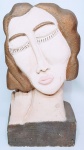 LEYA TERRANOVA ROCHA - Belíssima e grandiosa escultura moderna finamente esculpida em raríssima técnica de concreto armado de excepcional qualidade representando figura de rosto feminina. Med. 60 x 29 x 13CM. Bom estado de conservação. NOTA: Leya Terranova Rocha começou suas atividades no atelier de Bernardo Caro em 1976 retomando-as em 1991 no atelier Cristina Roese. Desde então tem feito trabalhos em bronze, cimento, resina, pedras, mármore, madeira e até mesmo raízes, sempre participou de salões nacionais e internacionais. Participou desde 1992 de mais de 70 exposições e palestras nacionais como o salão das belas artes, EMRJ, salão de arte contemporânea de São Paulo, exposição Casa D´Itália e muitas outras pelo Brasil, internacionalmente participou de algumas em Portugal, na famosa galeria Pepper´s, Bienal internacional do prestígio, etc. Na Austrália participou em Camberra da exposição ´´QUINHENTOS ANOS DE ARTE BRASILEIRA´´. Já ganhou diversos prêmios, honrarias, medalhas e troféus pelo Brasil á fora.
