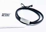 MONT BLANC - Impecável pulseira fabricada em couro preto trançado , adornada por rico trabalho e fecho de aço . Mont Blanc , Alemanha século XX . perfeito estado de conservação , sem uso . Acompanha bag . mede 46 cm de comprimento x 0,6 cm de espessura . Obs: Utilizada como pulseira de duas voltas .