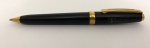 Caneta esferográfica Sheaffer, na cor preta, com detalhes em dourado. Com gravação 40 anos, Petros, 1970-2010, em perfeito estado. Necessita trocar carga.