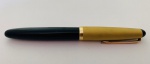 Caneta tinteiro Compactor, nacional, modelo estudante, anos 60/70, na cor preta, tampa em alumínio dourado. Em estado de nova.