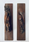 Arte Africana  Par de puxadores em Jacarandá entalhados com esculturas representando figura feminina e masculina. Med. 39x9 cm. (cada)