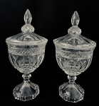 Duas Compoteiras de pé alto em demi cristal lapidação bico de jaca e base do pé recortada. Med. 24x11 cm. 