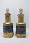 LUMINÁRIAS - Par de abajures em cerâmica. Alt. 32 cm.
