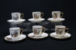 COLECIONISMO - Conjunto de 6 xícaras de café decoradas com cenas galantes e detalhes dourados. Med. 5,5x5,5 cm.