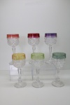 CRISTAL -  Lote de 6 taças em cristal da Bohemia, incolores, translucidos e com as bordas coloridas. Alt. 19,5 cm.