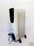 Aquecedor Elétrico Safe Heat  longhi 115 V/60HZ  1500 W.oil filled radiator, Funcionando. Medida 63 cm x 34 cm.