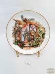 Prato Decorativo em Porcelana Cenas Natal. Medida 18,5 cm diametro.